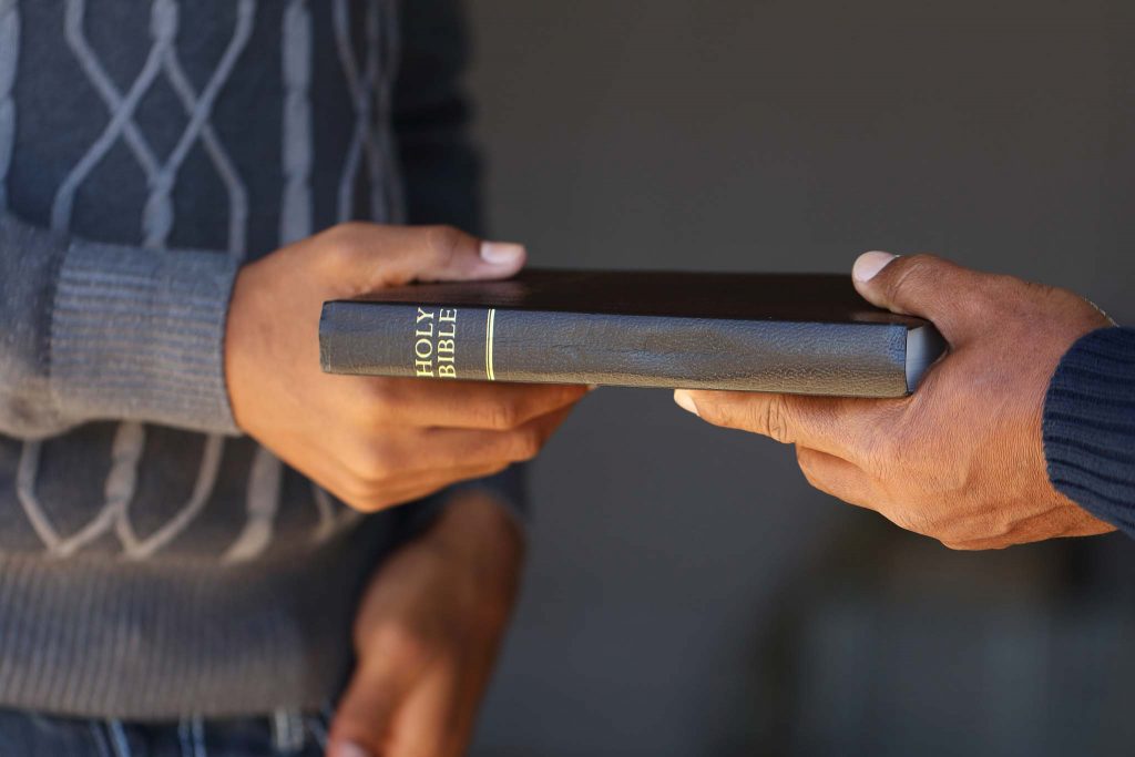 Handing someone a Bible